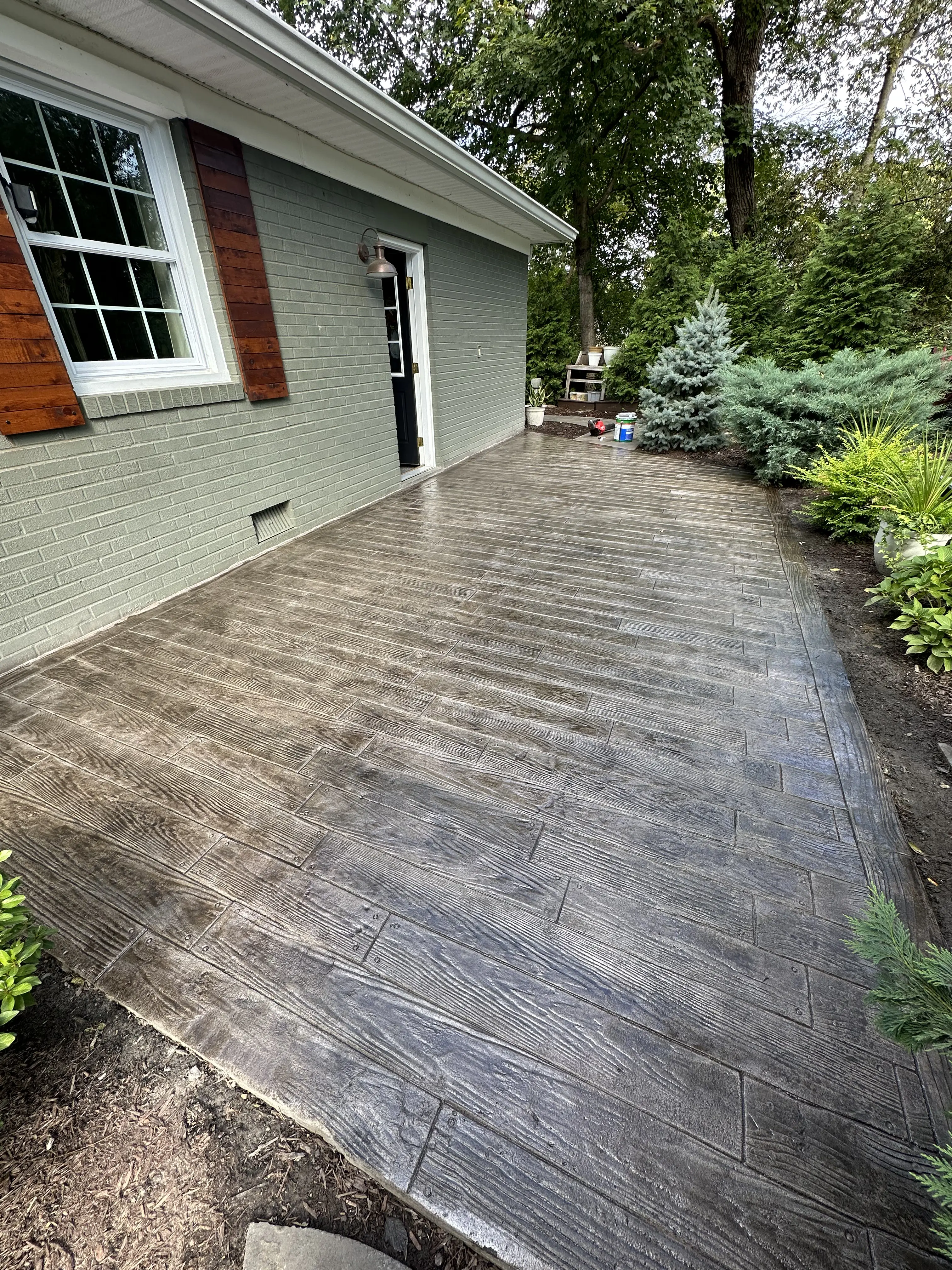 Wood plank stamped concrete walkway